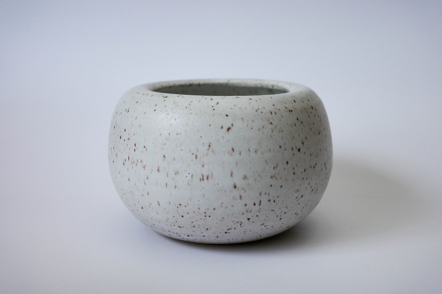 round speckled vase