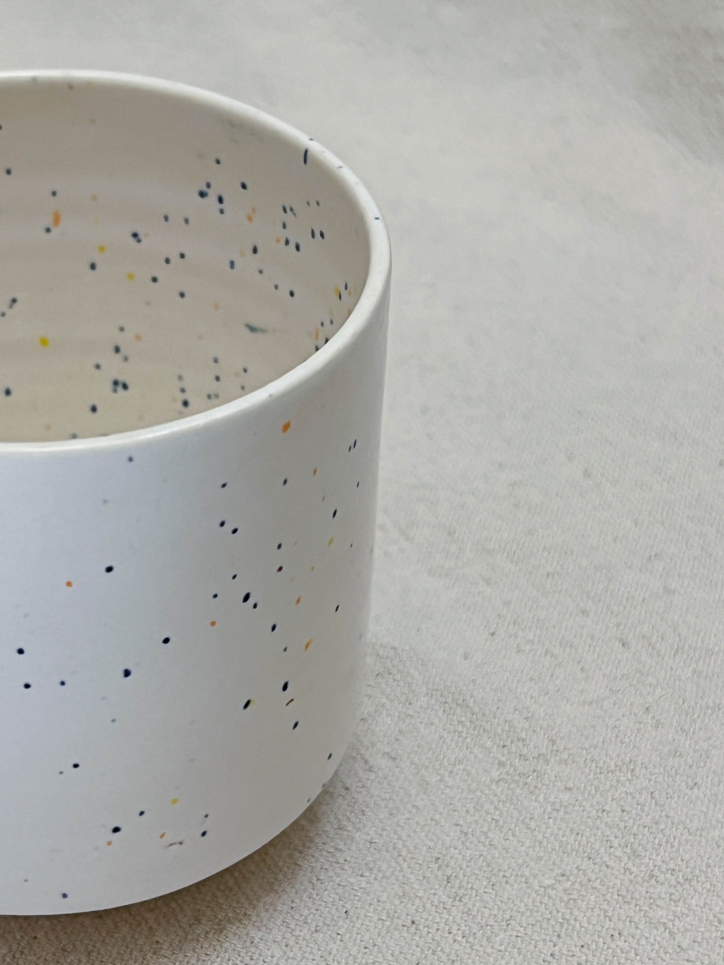 speckled angled cup